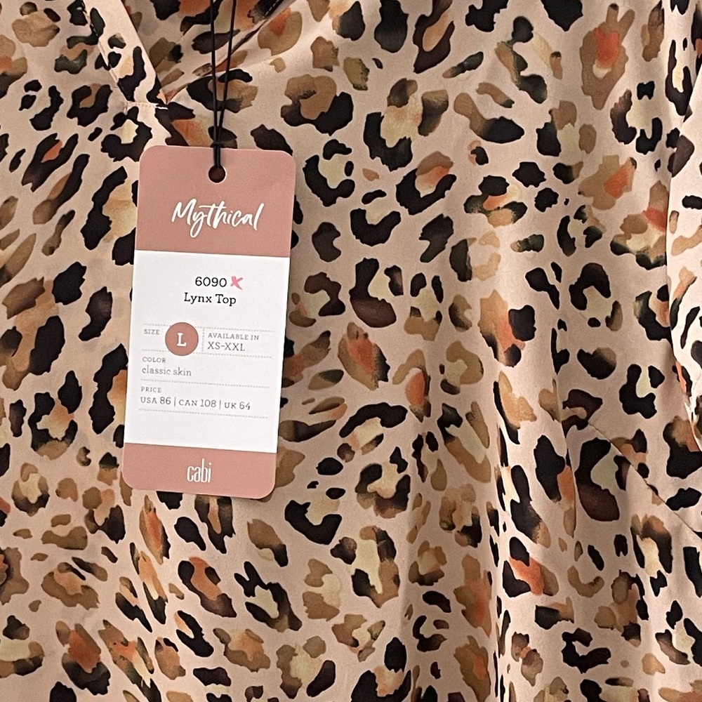 Cabi large cheetah print blouse.